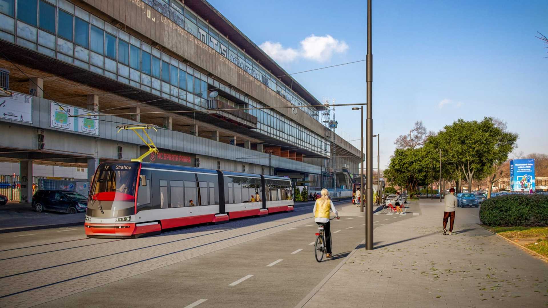 Vizualizace červenobílé tramvaje s cílem 13 Strahov na nové trati ve Vaníčkově ulici, podél dlouhého betonového bloku strahovských kolejí s pásovými okny a malovanými nápisy, vedle ní cyklistka v jízdním pruhu a nové osvětlovací stožáry u obrubníku.